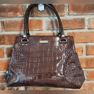 Classic Kate Spade Large Handbag. This bag is VERY roomy with lots of pockets an